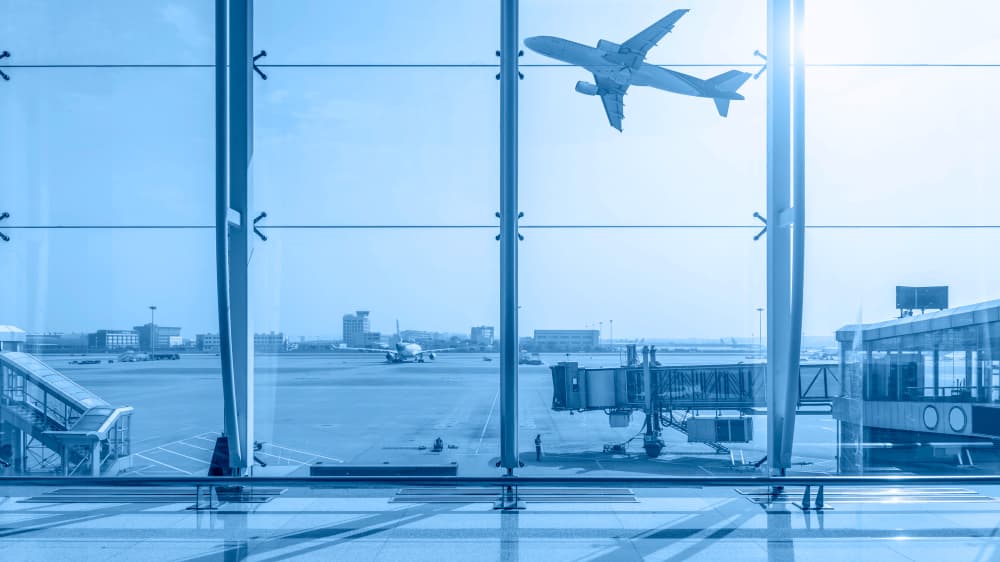 Airplane taking off at an airport runway